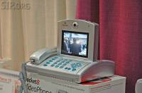 DSC_0048 Packet8 videophone. SIP based, but with proprietary extensions.