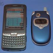 20050315j The BenQ P50 compared to a Motorola V300. The P50 runs the Sylantro SIP softphone.